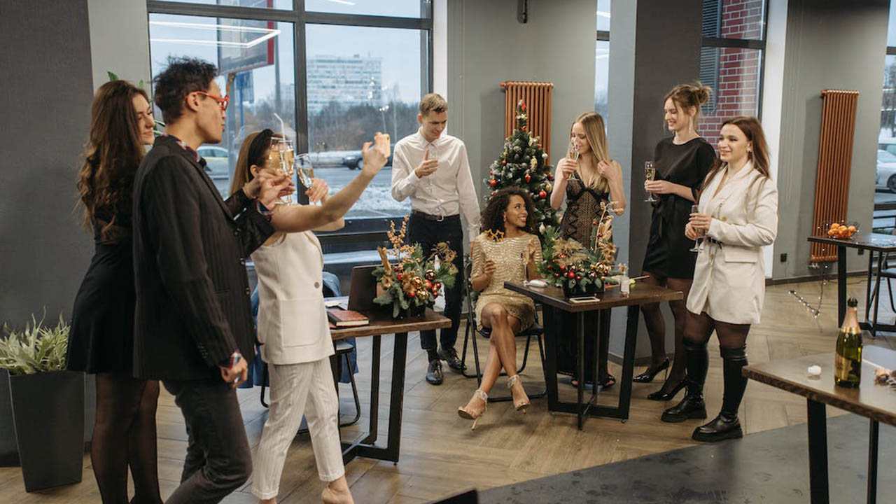 an office party where people exchange gifts